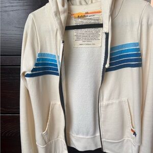 Aviator Nation Off-White Hoodie with Gradient Blue Stripes